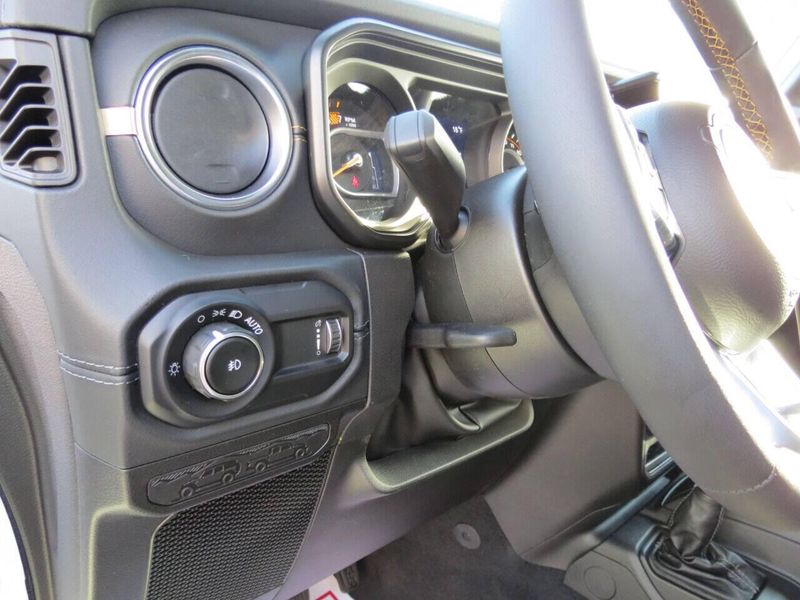 2024 Jeep Wrangler 4-door Sahara in a Bright White Clear Coat exterior color and Blackinterior. Militello Motors ​507-200-4344 militellomotors.net 