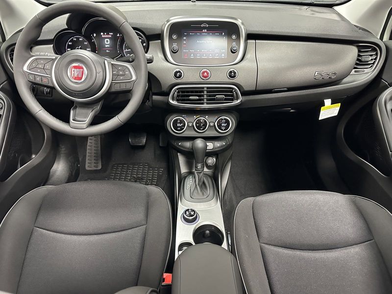 2023 Fiat 500x Pop Awd in a Bianco Gelato (White Clear Coat) exterior color and Blackinterior. Schmelz Countryside Alfa Romeo and Fiat (651) 968-0556 schmelzfiat.com 