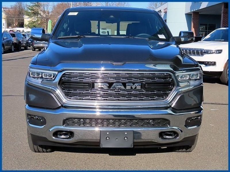 2024 RAM 1500 Limited in a Granite Crystal Metallic Clear Coat exterior color and Blackinterior. Papas Jeep Ram In New Britain, CT 860-356-0523 papasjeepram.com 