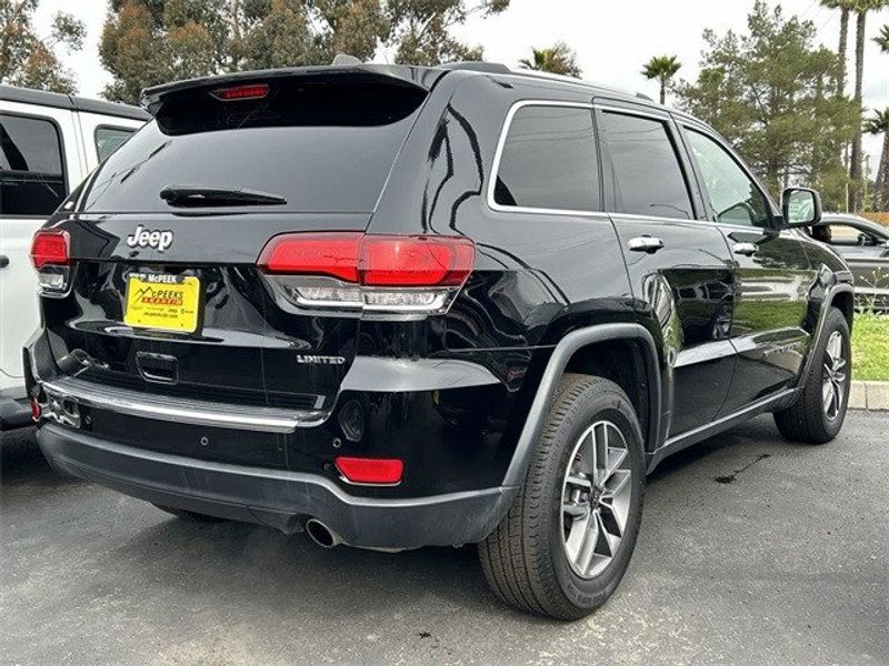 2021 Jeep Grand Cherokee Limited in a Diamond Black Crystal Pearl Coat exterior color and Blackinterior. McPeek