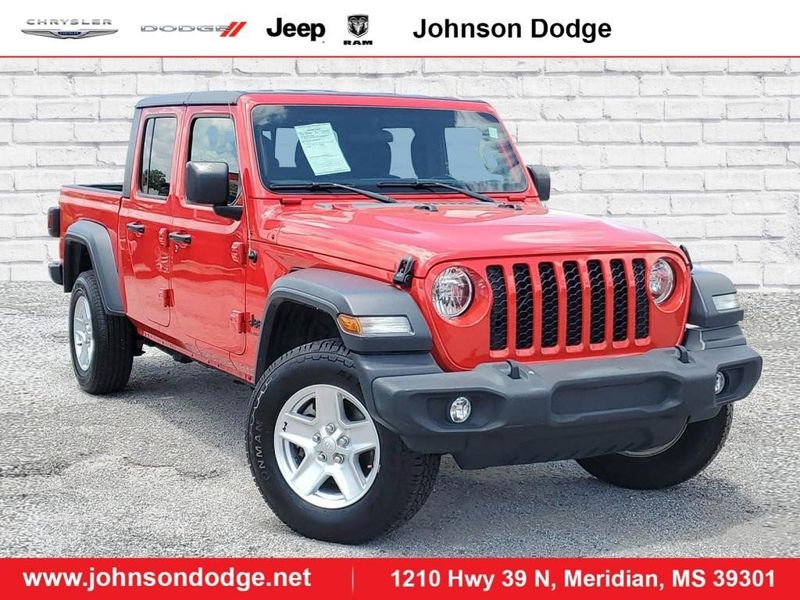 2020 Jeep Gladiator Sport S in a Firecracker Red Clear Coat exterior color and Blackinterior. Johnson Dodge 601-693-6343 pixelmotiondemo.com 