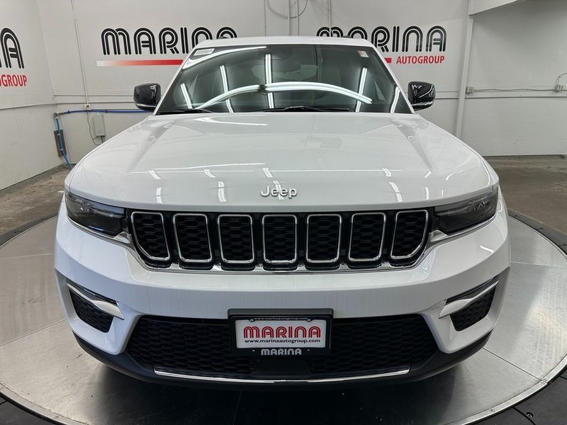 2024 Jeep Grand Cherokee Limited 4x4 in a Bright White Clear Coat exterior color and Wicker Beige/Blackinterior. Marina Auto Group (855) 564-8688 marinaautogroup.com 