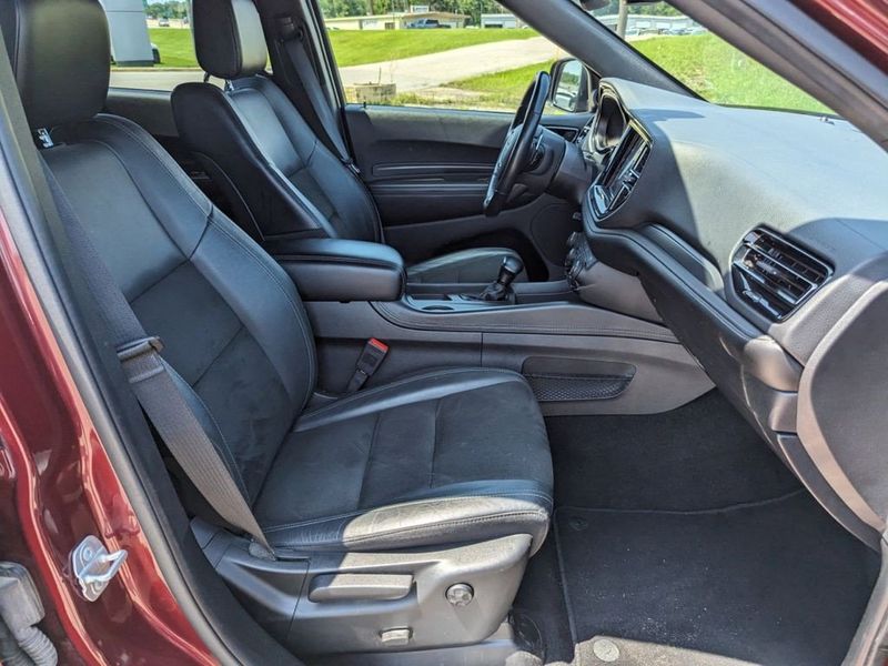 2021 Dodge Durango GT Plus in a Octane Red Pearl Coat exterior color and Blackinterior. Johnson Dodge 601-693-6343 pixelmotiondemo.com 