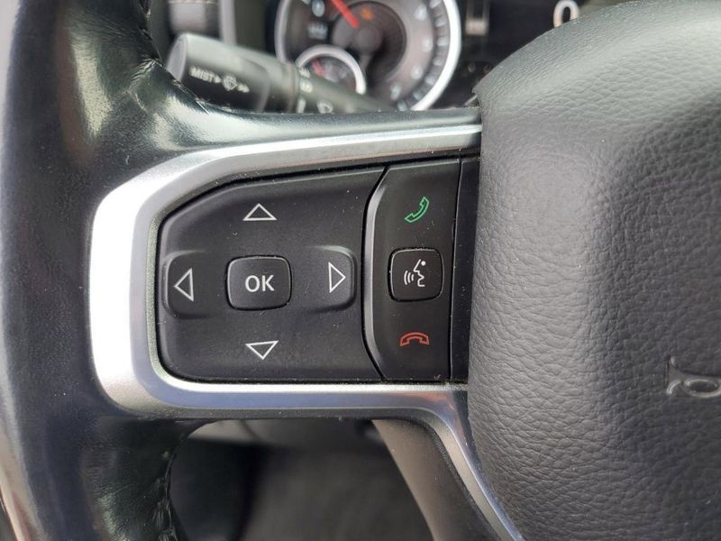 2020 RAM 1500 Laramie in a Bright White Clear Coat exterior color and Blackinterior. Johnson Dodge 601-693-6343 pixelmotiondemo.com 