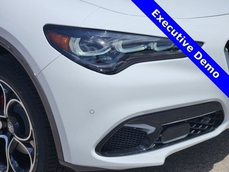 2024 Alfa Romeo Stelvio Ti in a Alfa White exterior color and Blackinterior. Northside Imports Houston 281-475-4549 northsideimportshouston.com 