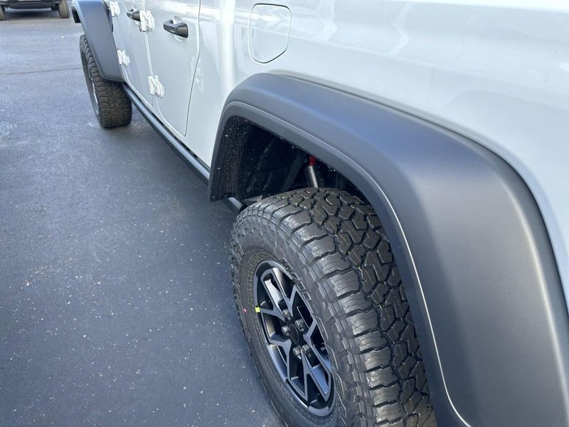 2024 Jeep Gladiator Rubicon 4x4 in a Bright White Clear Coat exterior color. Gupton Motors Inc 615-384-2886 guptonmotors.com 