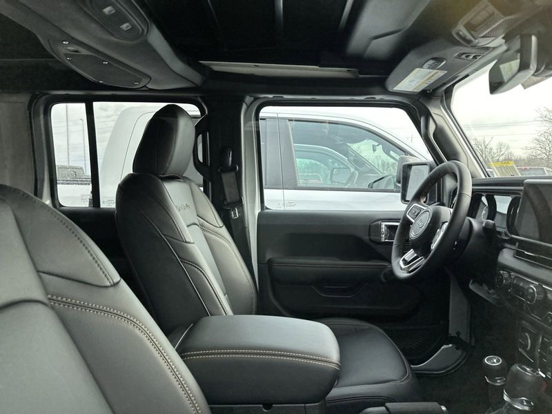 2024 Jeep Wrangler 4-door Sahara in a Silver Zynith Clear Coat exterior color and Blackinterior. Gupton Motors Inc 615-384-2886 guptonmotors.com 