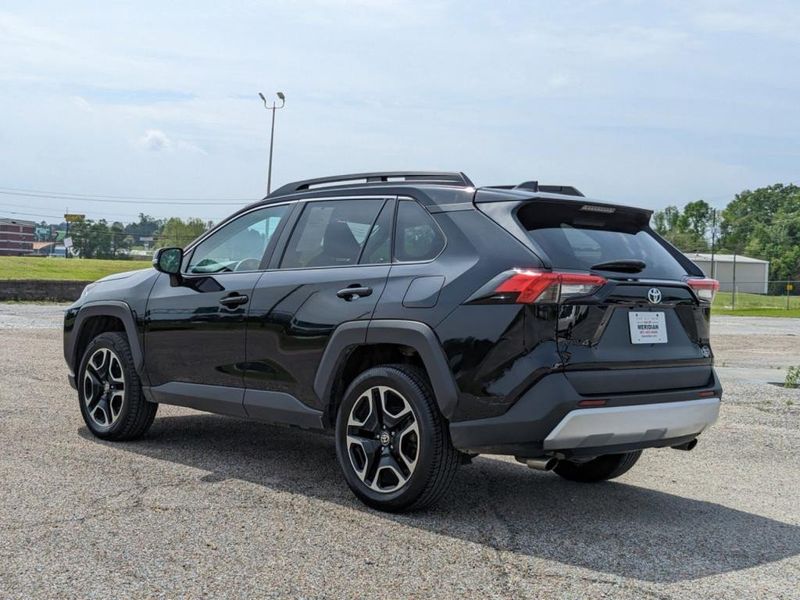 2021 Toyota RAV4 Adventure in a Midnight Black Metallic exterior color. Johnson Dodge 601-693-6343 pixelmotiondemo.com 