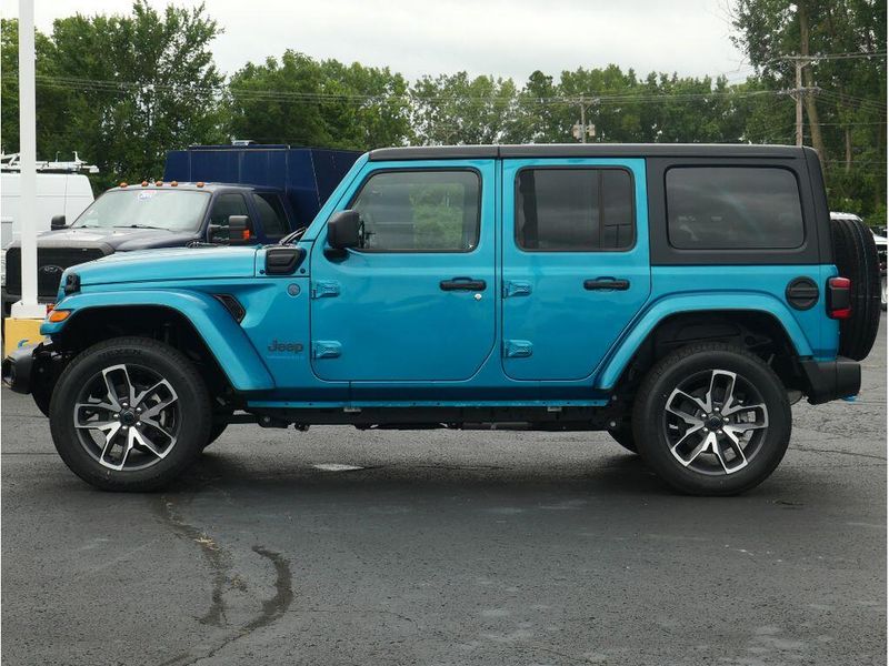 2024 Jeep Wrangler 4-door Sport S 4xe in a Bikini Pearl Coat exterior color and Blackinterior. Paul Sherry Chrysler Dodge Jeep RAM (937) 749-7061 sherrychrysler.net 