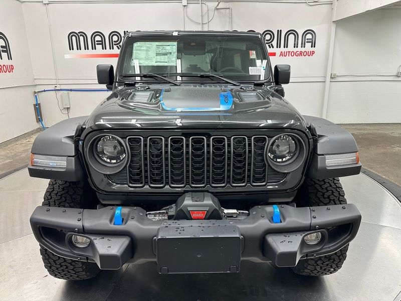 2024 Jeep Wrangler 4-door Rubicon 4xe in a Black Clear Coat exterior color and Blackinterior. Marina Chrysler Dodge Jeep RAM (855) 616-8084 marinadodgeny.com 