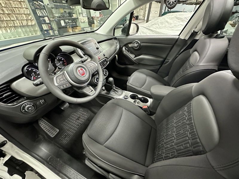 2023 Fiat 500x Pop Awd in a Bianco Gelato (White Clear Coat) exterior color and Blackinterior. Schmelz Countryside Alfa Romeo and Fiat (651) 968-0556 schmelzfiat.com 