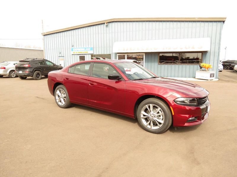 2023 Dodge Charger SXT Awd in a Octane Red exterior color and Blackinterior. Militello Motors ​507-200-4344 militellomotors.net 