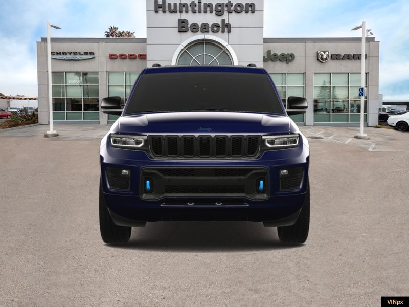 2023 Jeep Grand Cherokee 4xe Base 30th Anniversary 4x4 in a Midnight Sky exterior color and Global Blackinterior. BEACH BLVD OF CARS beachblvdofcars.com 