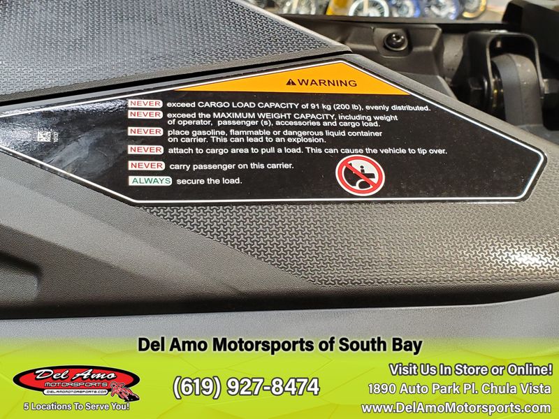 2024 Can-Am 7ARA  in a CARBON BLACK & NEO YELLOW exterior color. Del Amo Motorsports delamomotorsports.com 