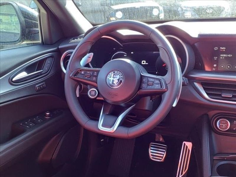 2024 Alfa Romeo Stelvio Veloce in a Vulcano Black Metallic exterior color and Blackinterior. Northside Imports Houston 281-475-4549 northsideimportshouston.com 