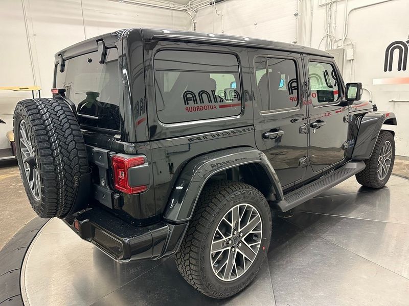 2024 Jeep Wrangler 4-door High Altitude 4xe in a Black Clear Coat exterior color and Green/Blackinterior. Marina Auto Group (855) 564-8688 marinaautogroup.com 