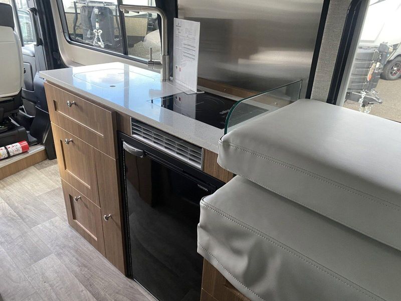 2024 ROADTREK Pivot  in a Silver Metallic exterior color and Chestnut Browninterior. Legacy Powersports 541-663-1111 legacypowersports.net 