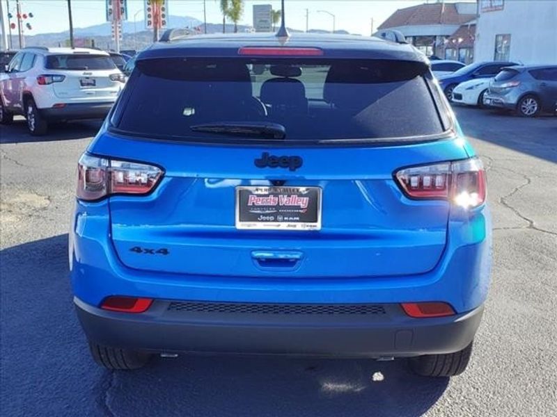 2024 Jeep Compass Latitude 4x4 in a Laser Blue Pearl Coat exterior color and Blackinterior. Perris Valley Chrysler Dodge Jeep Ram 951-355-1970 perrisvalleydodgejeepchrysler.com 