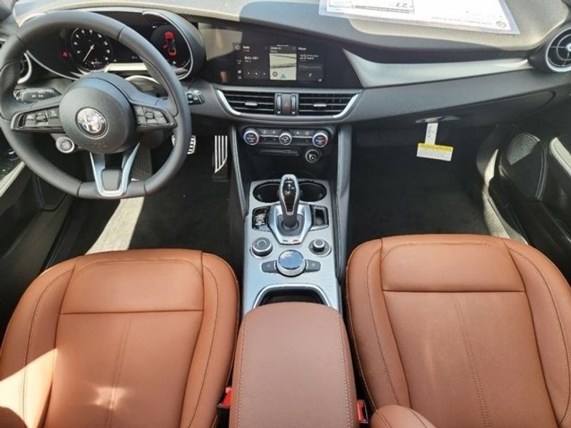 2024 Alfa Romeo Giulia Ti in a Vesuvio Gray Metallic exterior color and Blackinterior. Northside Imports Houston 281-475-4549 northsideimportshouston.com 