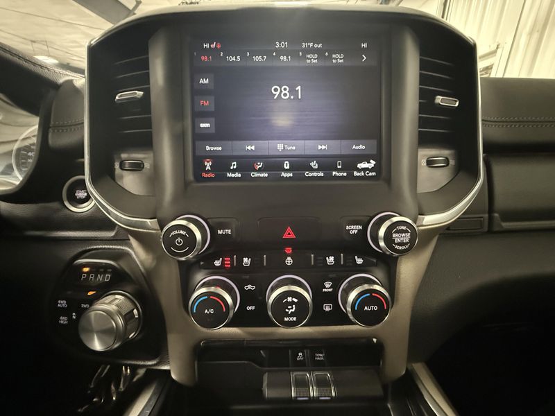 Used 2020 RAM 1500 Laramie in a Bright White Clear Coat exterior color and Blackinterior. Thys Motor Company 319-318-6640 thysmotorco.com 