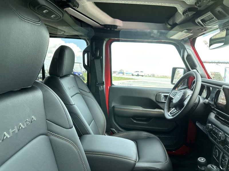 2024 Jeep Wrangler 4-door Sahara in a Firecracker Red Clear Coat exterior color. Gupton Motors Inc 615-384-2886 guptonmotors.com 