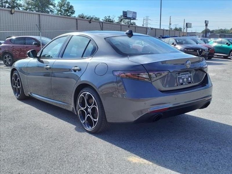 2024 Alfa Romeo Giulia Ti in a Vesuvio Gray Metallic exterior color and Blackinterior. Northside Imports Houston 281-475-4549 northsideimportshouston.com 