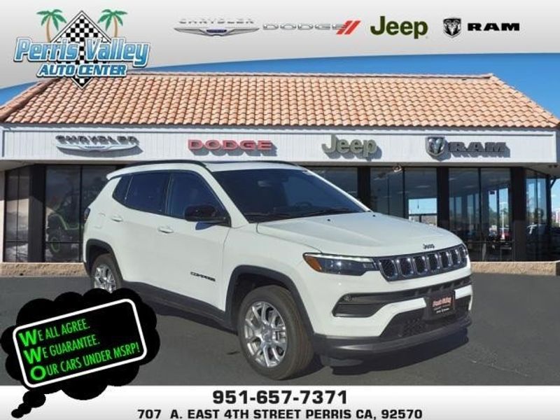 2024 Jeep Compass Latitude Lux 4x4 in a Bright White Clear Coat exterior color and Blackinterior. Perris Valley Chrysler Dodge Jeep Ram 951-355-1970 perrisvalleydodgejeepchrysler.com 
