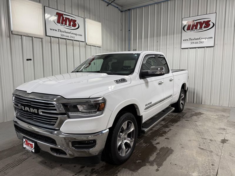 Used 2020 RAM 1500 Laramie in a Bright White Clear Coat exterior color and Blackinterior. Thys Motor Company 319-318-6640 thysmotorco.com 