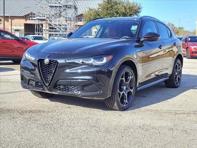 2024 Alfa Romeo Stelvio Veloce in a Vulcano Black Metallic exterior color and Blackinterior. Northside Imports Houston 281-475-4549 northsideimportshouston.com 