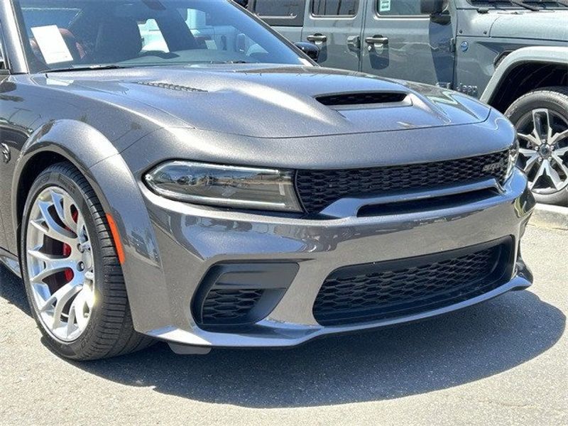 2023 Dodge Charger Srt Hellcat Widebody Jailbreak in a Granite exterior color and Demonic Red/Blackinterior. McPeek