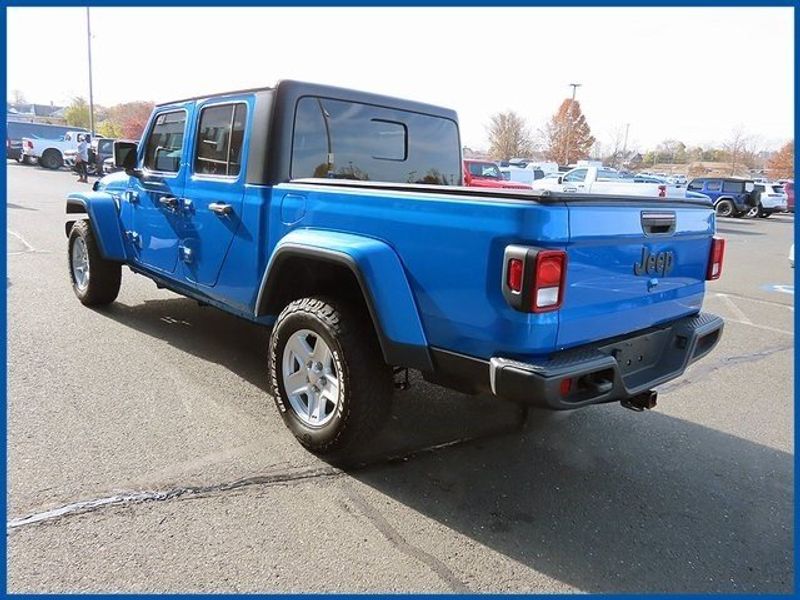 2021 Jeep Gladiator Sport in a Hydro Blue Pearl Coat exterior color and Blackinterior. Papas Jeep Ram In New Britain, CT 860-356-0523 papasjeepram.com 