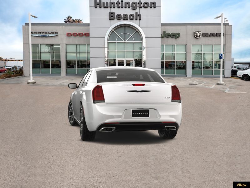 2023 Chrysler 300 Touring in a Bright White exterior color and Blackinterior. BEACH BLVD OF CARS beachblvdofcars.com 