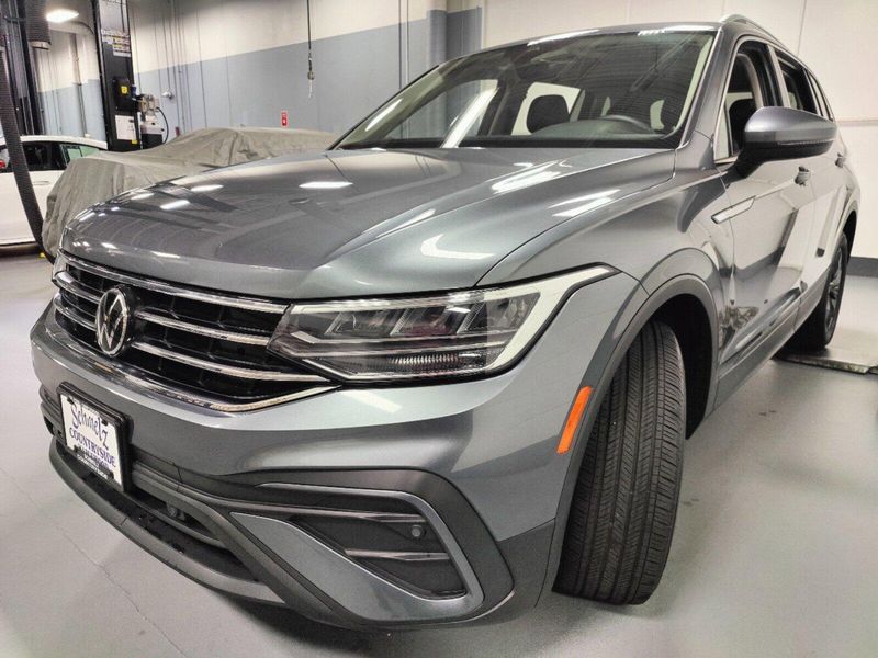 2023 Volkswagen Tiguan SE 7 Passenger Seating in a Platinum Gray Metallic exterior color and Black Heated Seatsinterior. Schmelz Countryside Alfa Romeo (651) 867-3222 schmelzalfaromeo.com 