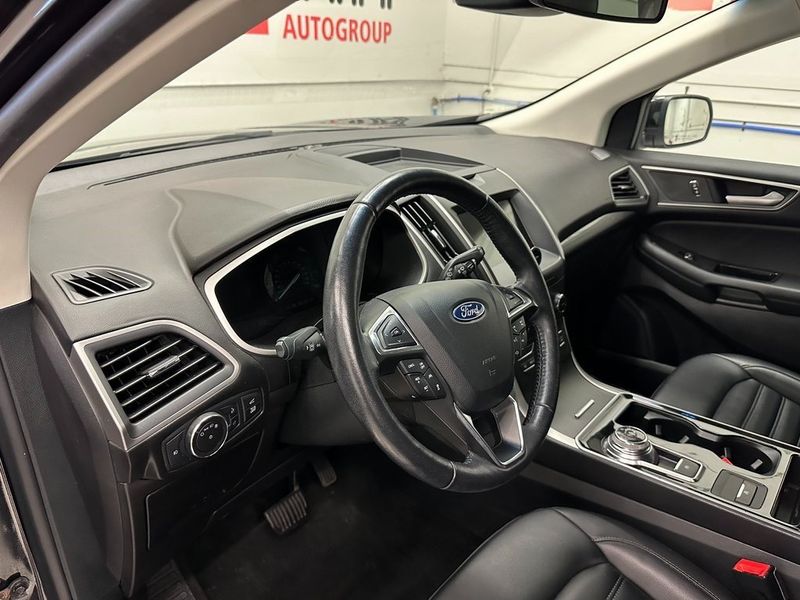 2020 Ford Edge SEL in a Agate Black exterior color and Ebonyinterior. Marina Chrysler Dodge Jeep RAM (855) 616-8084 marinadodgeny.com 