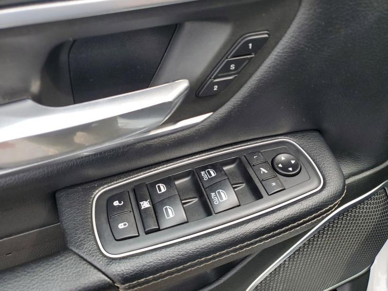 2020 RAM 1500 Laramie in a Bright White Clear Coat exterior color and Blackinterior. Johnson Dodge 601-693-6343 pixelmotiondemo.com 