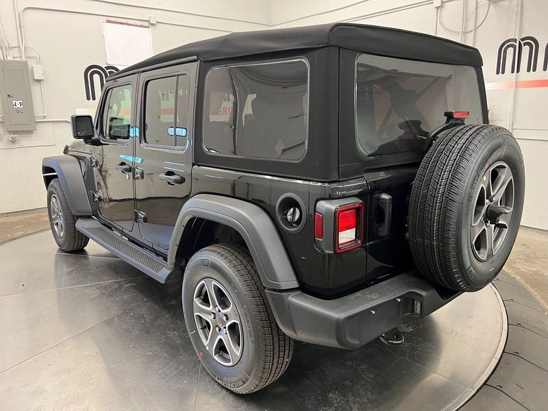 2023 Jeep Wrangler 4-door Sport S 4x4 in a Black Clear Coat exterior color and Blackinterior. Marina Chrysler Dodge Jeep RAM (855) 616-8084 marinadodgeny.com 