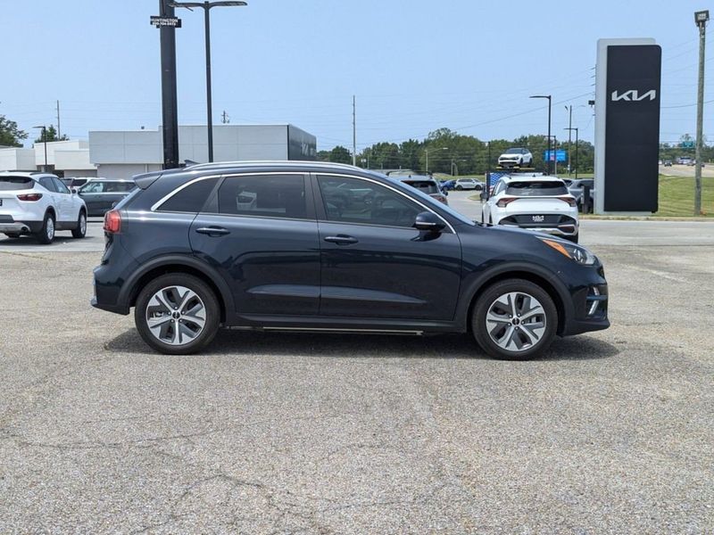 2022 Kia Niro EV EX Premium in a Gravity Blue exterior color and Charcoalinterior. Johnson Dodge 601-693-6343 pixelmotiondemo.com 