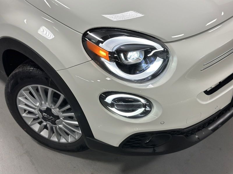 2023 Fiat 500x Pop Awd in a Bianco Gelato (White Clear Coat) exterior color and Blackinterior. Schmelz Countryside Alfa Romeo and Fiat (651) 968-0556 schmelzfiat.com 