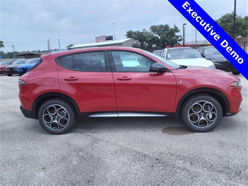 2024 Alfa Romeo Tonale Ti in a Alfa Rosso exterior color and Tan/Blackinterior. Northside Imports Houston 281-475-4549 northsideimportshouston.com 