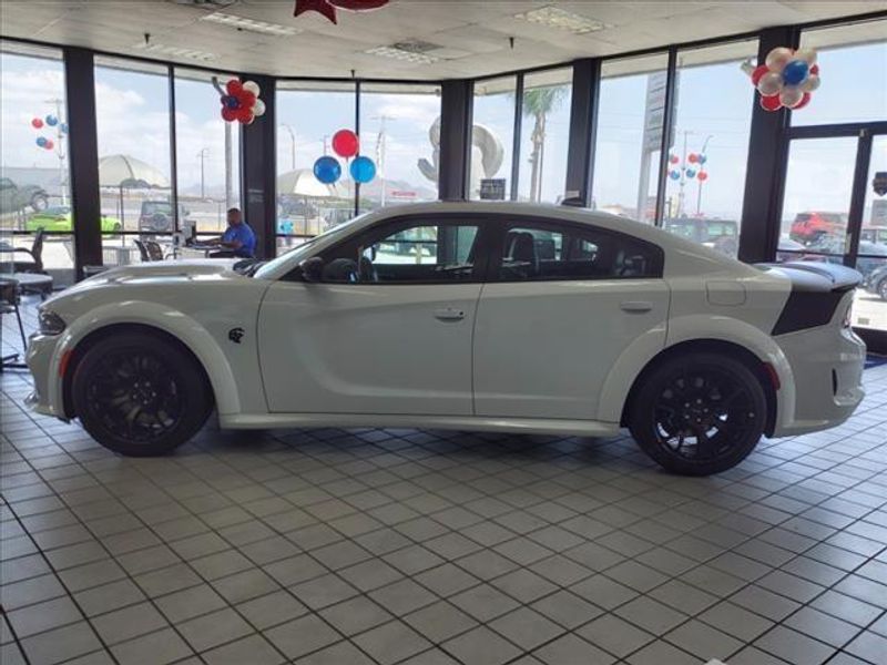 2023 Dodge Charger SRT Hellcat Widebody in a White Knuckle Clear Coat exterior color and Blackinterior. Perris Valley Auto Center 951-657-6100 perrisvalleyautocenter.com 
