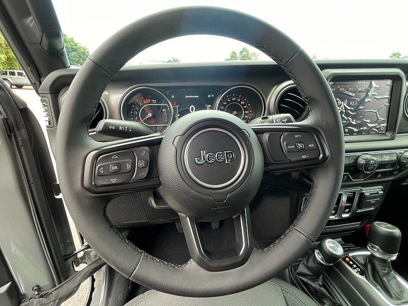 2023 Jeep Wrangler 2-door Sport S 4x4 in a Sting-Gray Clear Coat exterior color. Kona Auto Center 1-888-985-0772 konaautocenter.com 