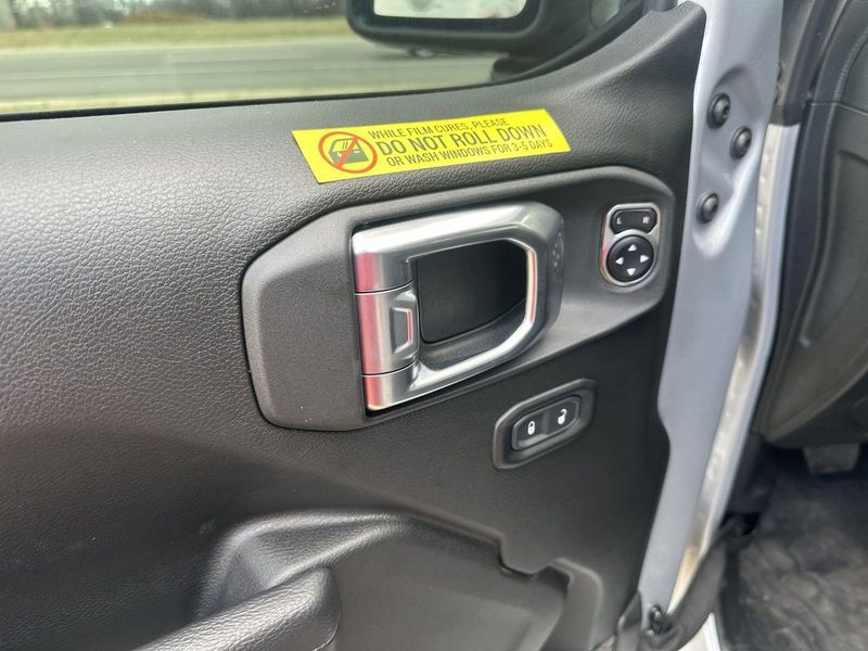 2024 Jeep Wrangler 4-door Sport S in a Silver Zynith Clear Coat exterior color and Blackinterior. Gupton Motors Inc 615-384-2886 guptonmotors.com 