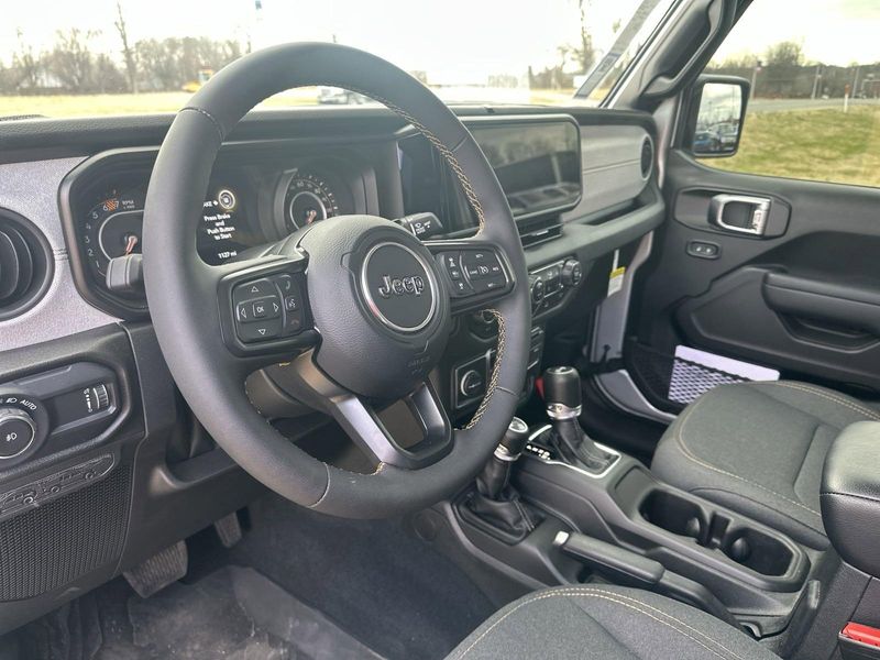 2024 Jeep Wrangler 4-door Sport S in a Silver Zynith Clear Coat exterior color and Blackinterior. Gupton Motors Inc 615-384-2886 guptonmotors.com 