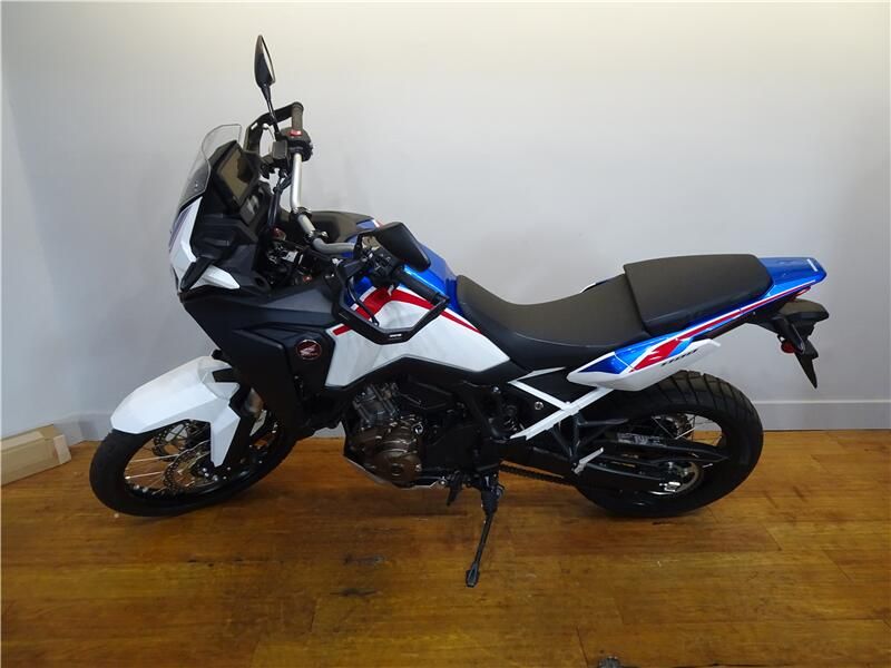 2021 Honda Africa Twin in a White exterior color. New England Powersports 978 338-8990 pixelmotiondemo.com 