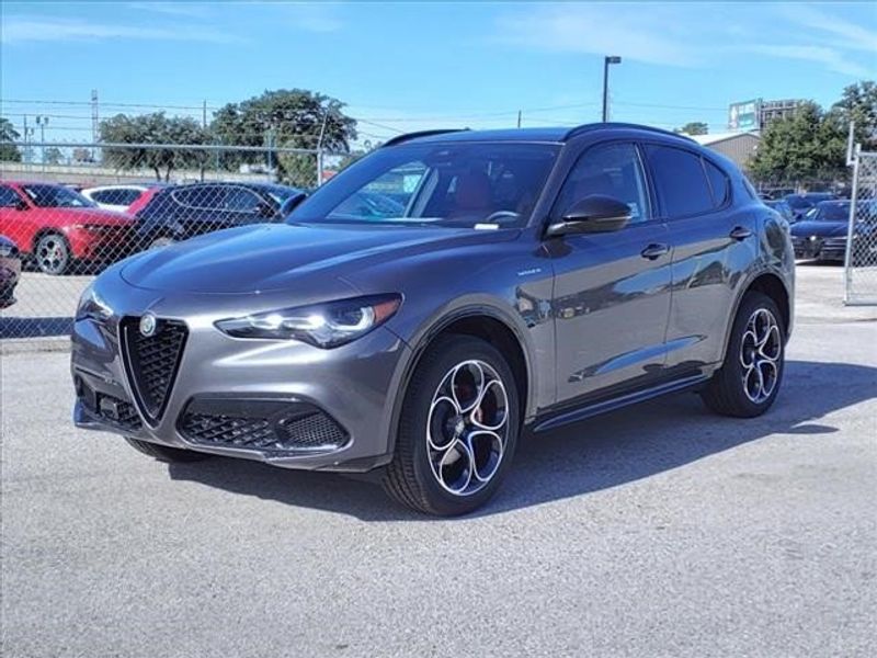 2024 Alfa Romeo Stelvio Veloce in a Vesuvio Gray Metallic exterior color and Blackinterior. Northside Imports Houston 281-475-4549 northsideimportshouston.com 