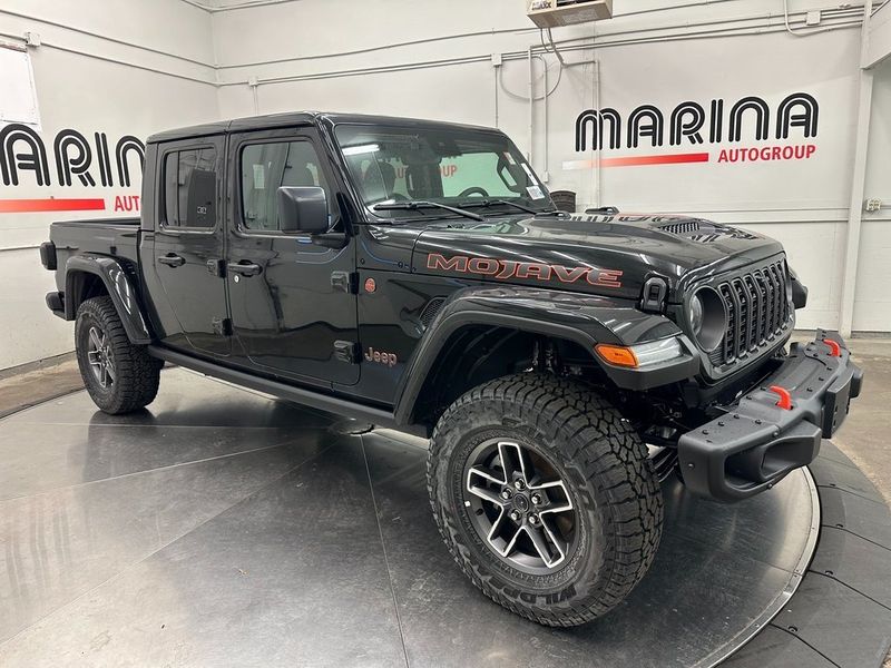 2024 Jeep Gladiator Mojave X 4x4 in a Black Clear Coat exterior color. Marina Chrysler Dodge Jeep RAM (855) 616-8084 marinadodgeny.com 