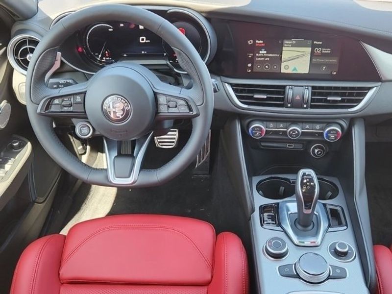 2024 Alfa Romeo Giulia Veloce in a Vulcano Black Metallic exterior color and Blackinterior. Northside Imports Houston 281-475-4549 northsideimportshouston.com 