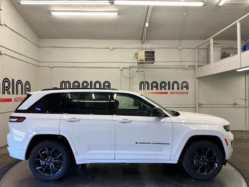 2024 Jeep Grand Cherokee Anniversary Edition 4xe in a Bright White Clear Coat exterior color and Global Blackinterior. Marina Auto Group (855) 564-8688 marinaautogroup.com 