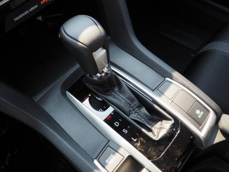 2020 Honda Civic Sedan EX in a Lunar Silver Metallic exterior color and Blackinterior. BEACH BLVD OF CARS beachblvdofcars.com 