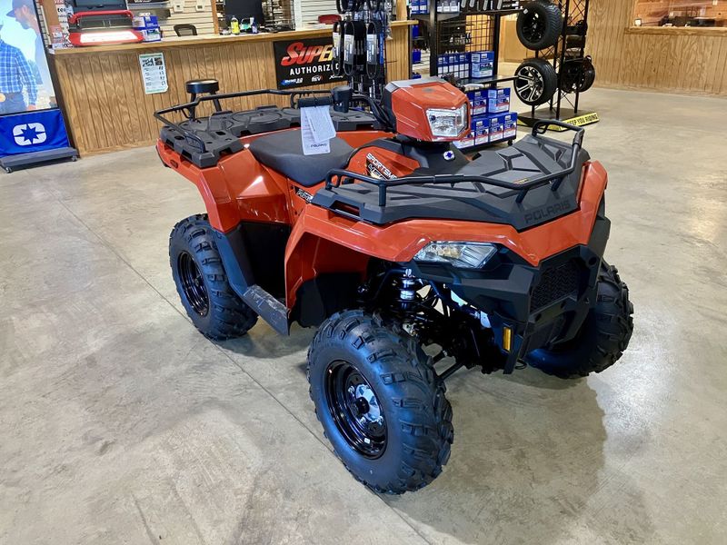 2024 Polaris Sportsman 450 H.O. EPS in a Orange exterior color. Genuine RV & Powersports (936) 569-2523 